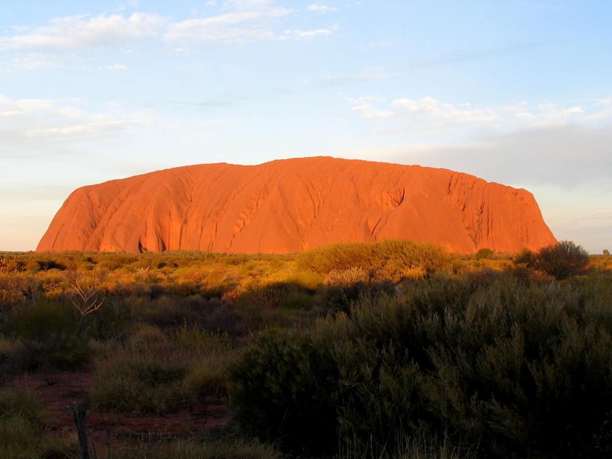 Uluru (Ayers Rock) is an inselberg, or island mountain, found in the Northern Territory near Alice Springs - in the middle of Australia's Outback. It is a large sandstone rock formation that the aborigines of the area hold sacred.