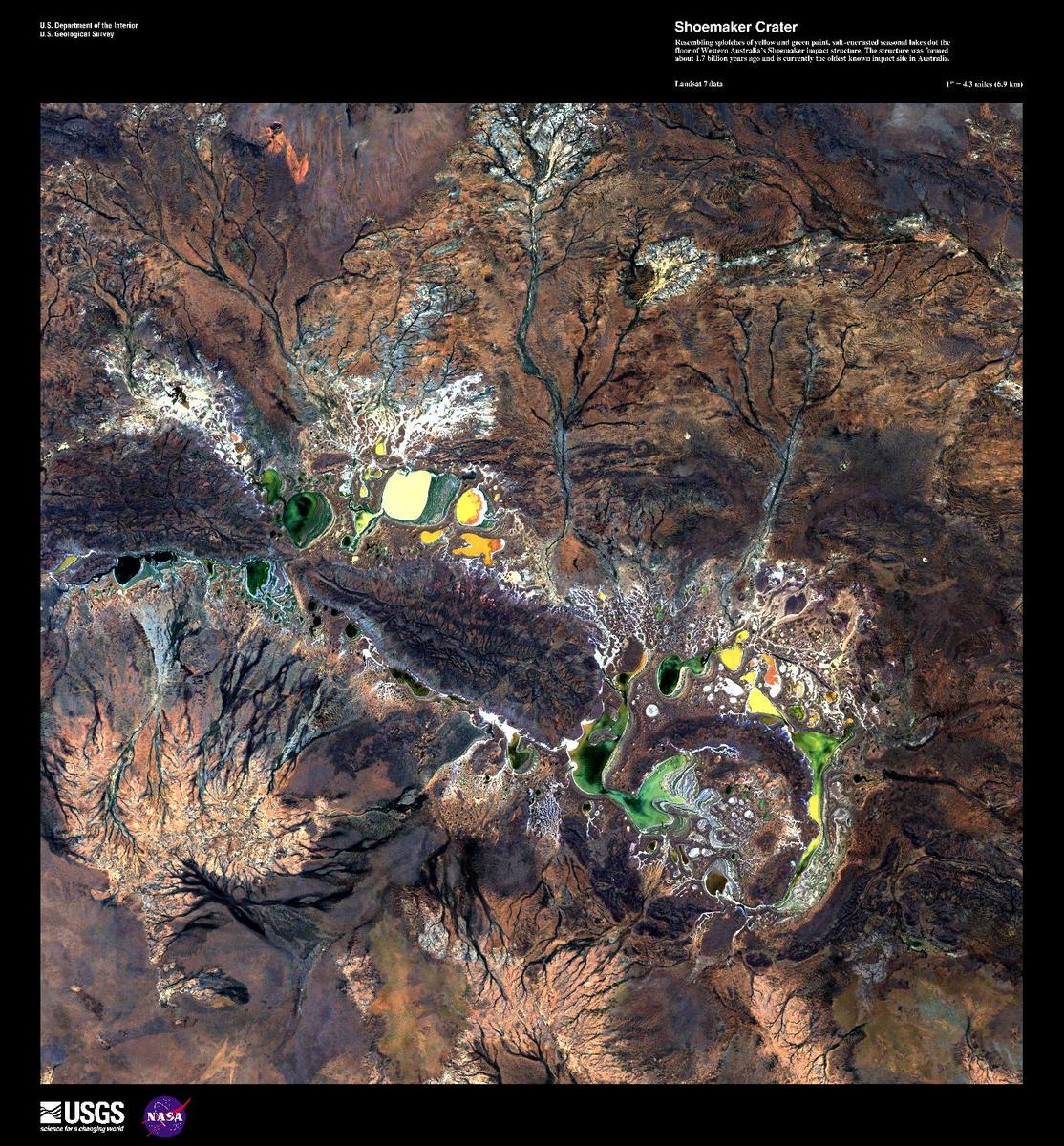 Resembling splotches of yellow and green paint, salt-encrusted seasonal lakes - the largest of which is Lake Teague - dot the floor of the Shoemaker impact crater in this enhanced satellite image. Formerly known as the Teague Ring, the structure was formed about 1.7 billion years ago and is currently the oldest known impact site in Australia. Image courtesy of USGS.