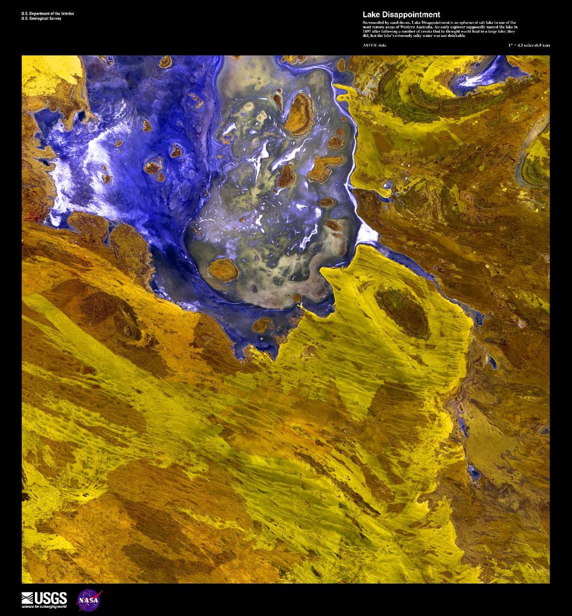 A false-color satellite image of Lake Disappointment, an ephemeral salt lake surrounded by sand dunes in one of the most remote areas of Western Australia. An early explorer supposedly named the lake in 1897 after following a number of creeks that he thought would lead to a large lake; they did, but the lake's extremely salty water was not drinkable. Image courtesy of USGS.