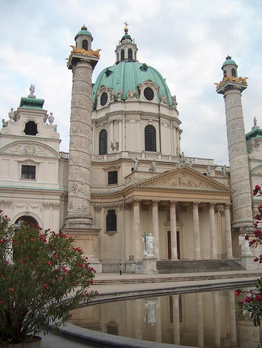 The Karlskirche (St. Charles Borromeo Church) in Vienna, built between 1716 and 1737, is a Baroque masterpiece. Its architect, Johann Bernhard Fischer von Erlach, sought to fuse elements and ideas from the most significant churches in Europe, including the Pantheon and St. Peter's Basilica in Rome, the Hagia Sofia in Constantinople, the Dome des Invalides in Paris, and St. Paul's Cathedral in London.