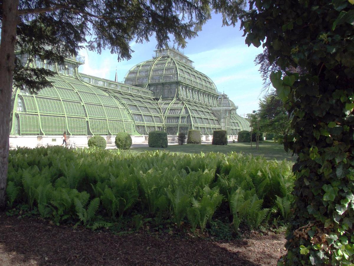 The massive Palmenhaus is the most prominent of four greenhouses on the grounds of Schoenbrunn Palace. Opened in 1882, it is among the largest botanical exhibits of its kind in the world, housing some 4,500 species (most tropical). Its oldest plant is a 350-year-old olive tree.