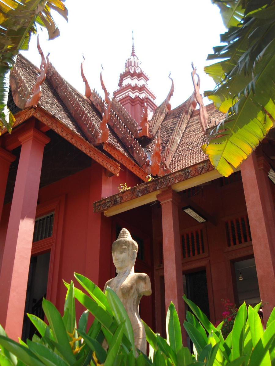Entrace to the National Museum of Cambodia in Phnom Penh. Built between 1917 and 1924 to preserve Cambodia's cultural traditions, it houses the world's largest collections of Khmer art from prehistoric times through the Khmer Empire. It also displays an important collection of Buddhist and Hindu sculptures.