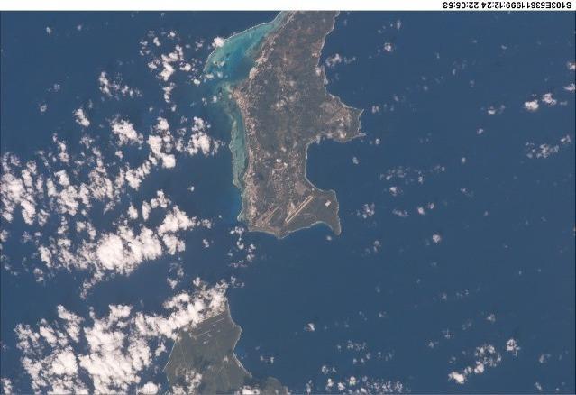 A view of two of the Mariana Islands as seen from the space shuttle - Saipan (to the north) and Tinian.