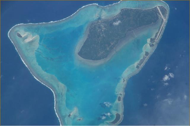A close up view of Aitutaki. The island's airport may be seen on the northern point (upper right). Image courtesy of NASA.