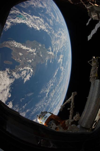 The Caribbean island of Hispaniola, jointly occupied by Haiti and the Dominican Republic, dominates this space station view of the earth. Haiti, with its northern and southern pincer-like peninsulas, takes up the western third of the island, while the Dominican Republic occupies the triangular eastern two-thirds. Photo courtesy of NASA.