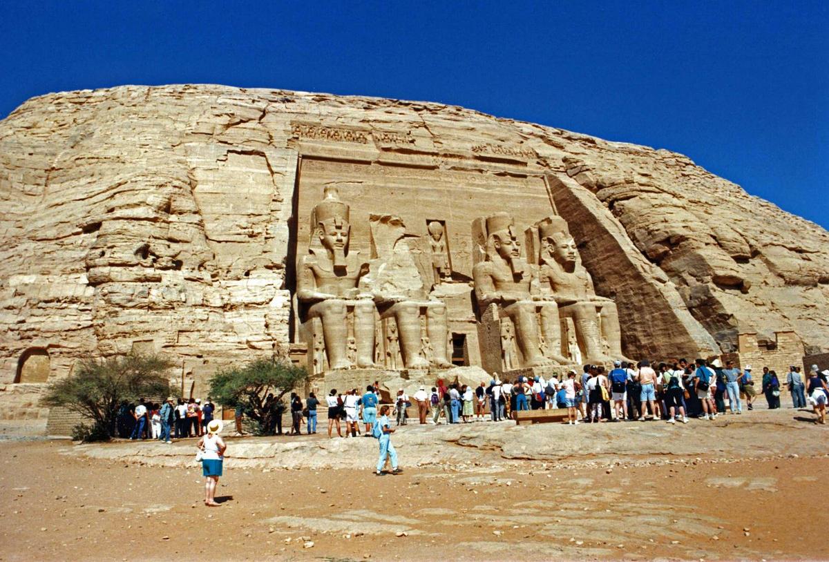 The temples at Abu Simbel were moved to higher ground in the 1960s to save them from the flooding caused by the completion of the Aswan Dam. The carvings on the Great Temple shown here (completed about 1265 B.C.) dwarf mere humans.