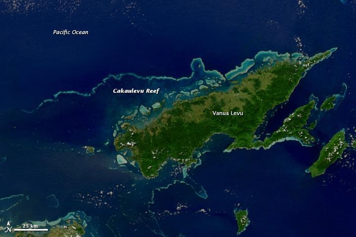 This satellite image shows Fiji's second-largest island, Vanua Levu, and the Cakaulevu Reef that shelters the island's northern shore. Also called the Great Sea Reef, Cakaulevu shines turquoise through clear, shallow waters. It is the third longest continuous barrier reef in the world, behind the Great Barrier Reef in Australia and the Mesoamerica Reef off Central America. When combined with the nearby Pascoe Reef, Cakaulevu Reef is about 200 km (120 mi) long. On its own, the Cakaulevu Reef covers 202,700 sq km (77,200 sq mi).
The first systematic survey of the reef (in 2004) revealed a diverse marine population, including unique mangrove ecosystems and endemic fish. Twelve threatened species live within the reef: 10 fish species, the green turtle, and the spinner dolphin. All of this marine life has traditionally supported the native population, and currently some 70,000 people depend on the reef. After seeing fish populations decline in recent decades, local leaders created a series of marine protected areas in 2005 where fishing is prohibited. Where the ban has been enforced, fish populations have rebounded and spilled over into areas where fishing is permitted. Photo courtesy of NASA.