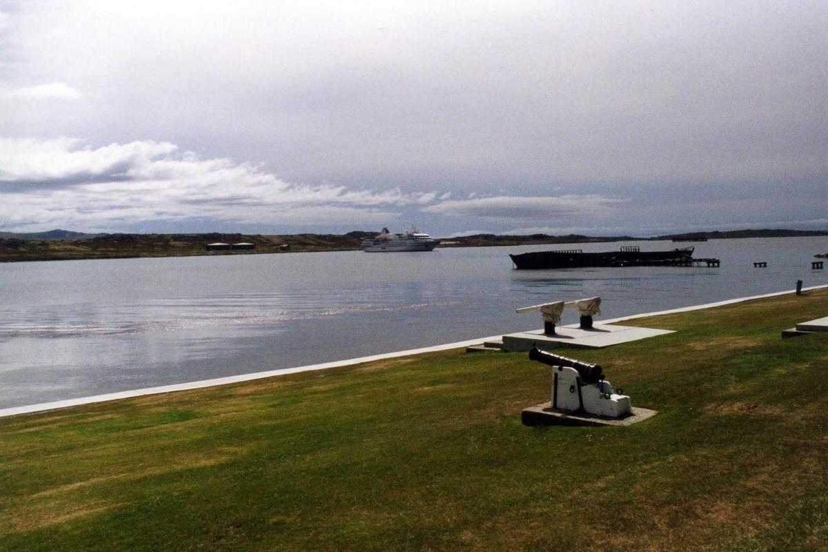 A Stanley shoreline view with a cruise ship in the background. Stanley is the only "city" on the islands (population about 2,100) and is the main shopping area.