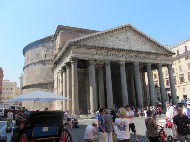 The Pantheon in the Plaza della Rotonda in Rome. Its current form dates from about A.D. 126 when the Emperor Hadrian rebuilt it over Marcus Agrippa's original temple dating from 27 B.C. The temple was dedicated to the classical gods. The name comes from the Greek words pan (all) and theos (god). The Pantheon has been a Christian church since about 608.