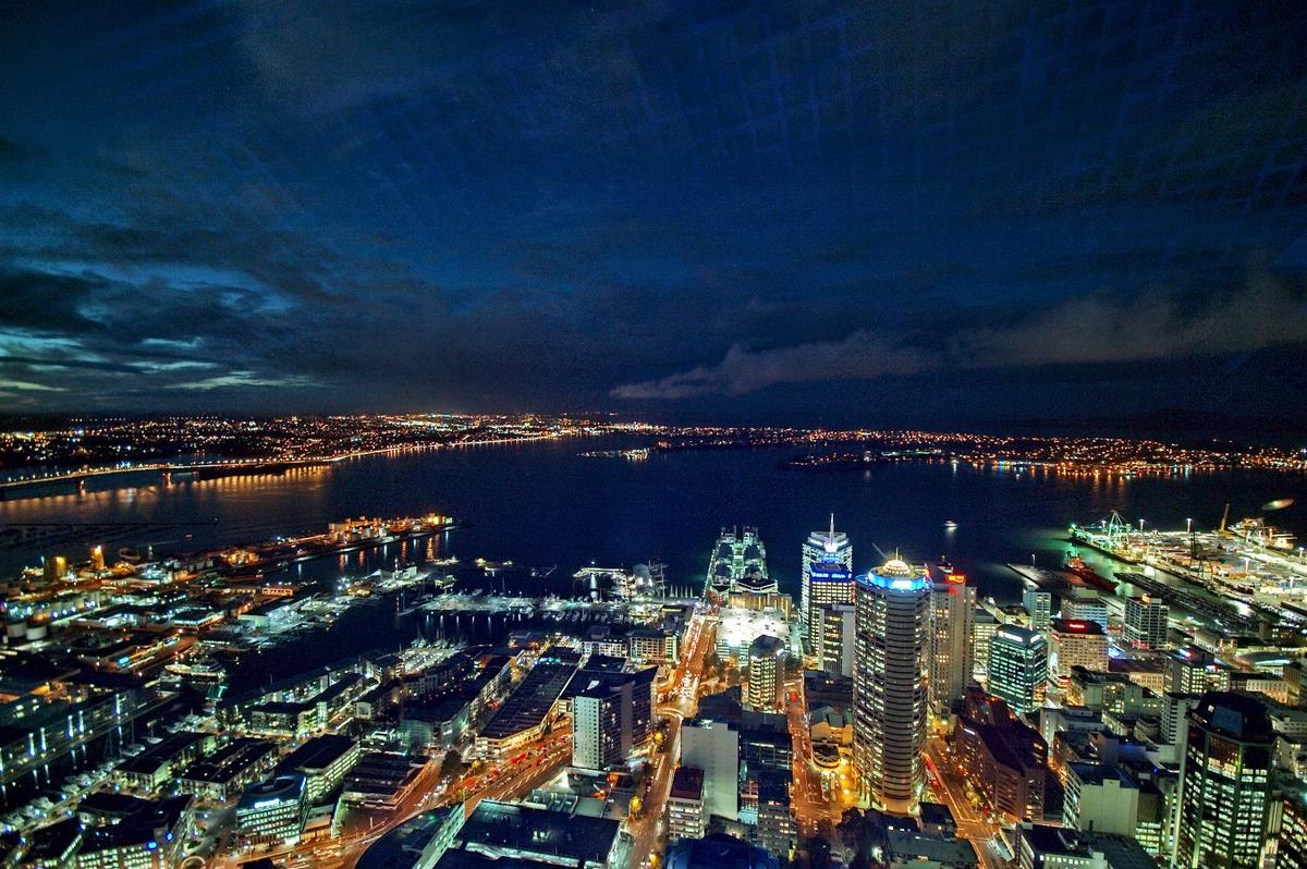 The city of Auckland, the largest in New Zealand, is home to almost a third of the country's population. This is a view of the North Island city at night as seen from its tallest tower.