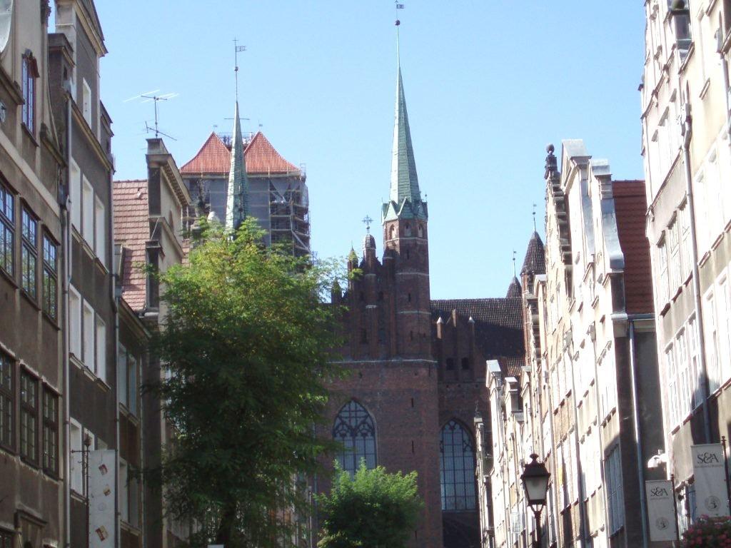 Saint Mary's Church in Gdansk as seen from Mariacka (Saint Mary's Gate). Saint Mary's, built between 1343 and 1502, is the largest brick church in the world, and can hold 25,000 people.