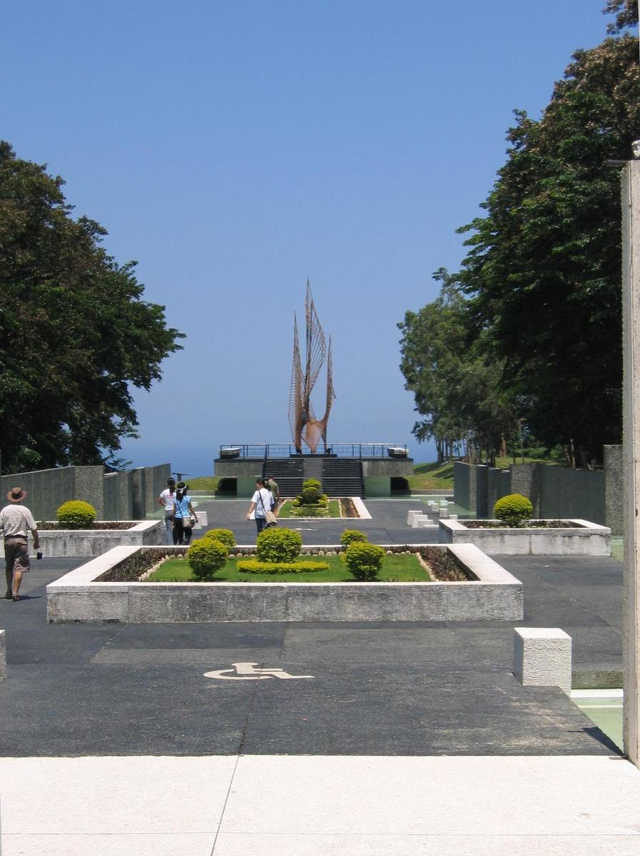 On the grounds of the Pacific War Memorial, Corregidor. The sculpture is entitled the "Eternal Flame of Freedom."