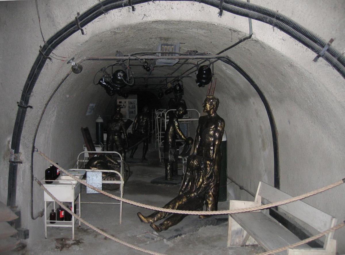Certain lateral tunnels of the Malinta Tunnel complex present dioramas that show what life was like inside the tunnels. This display represents one of the hospital laterals and depicts the treatment of wounded.