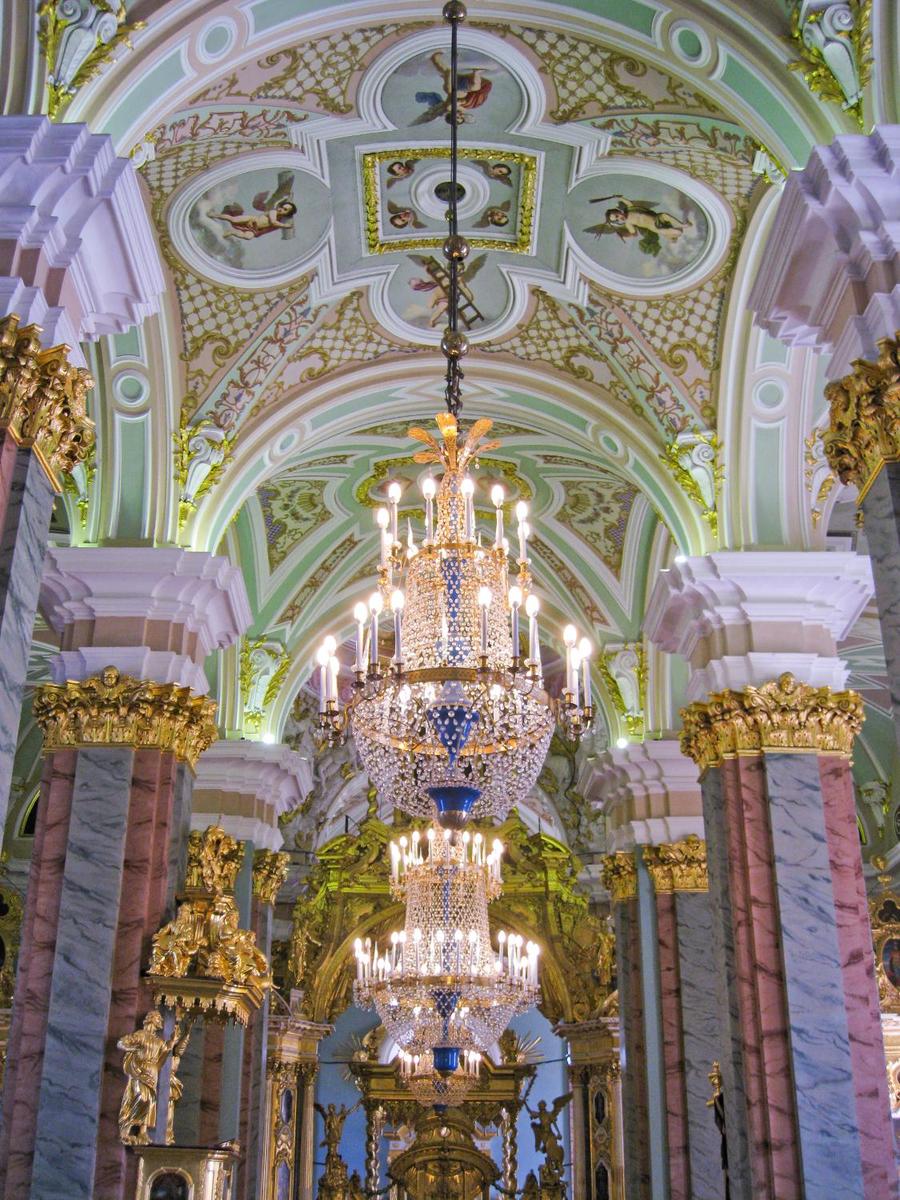Pastel colors highlight the central nave of the Saints Peter and Paul Cathedral in Saint Petersburg. The Cathedral is located inside the Peter and Paul Fortress and houses the remains of almost all Russian emperors (and empresses) from Peter I to Nicholas II.