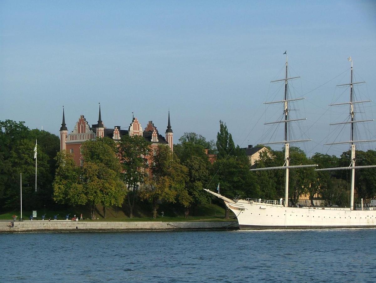 Admiralty House (built 1647-50) on the islet of Skeppsholmen in central Stockholm. Formerly occupied by the Royal Swedish Navy, it today houses the Swedish Tourist Association. The steel, full-rigged ship is the "af Chapman." Built in the UK in 1888, it served as a training ship and made several trips around the world. No longer in active service, it presently is a youth hostel.
