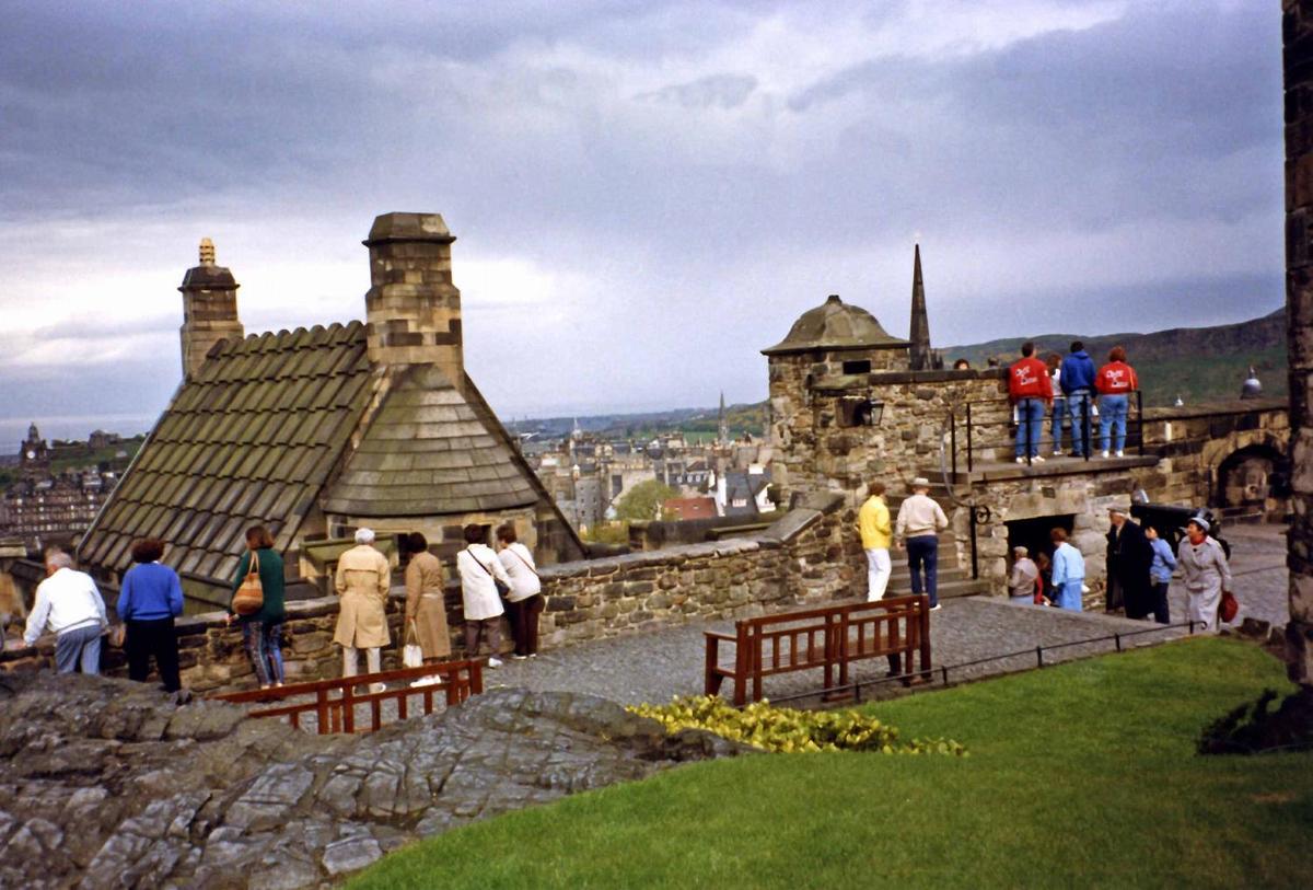 Looking out onto the city of Edinburgh from the walls of its castle. The oldest parts of the castle date to the 12th century.