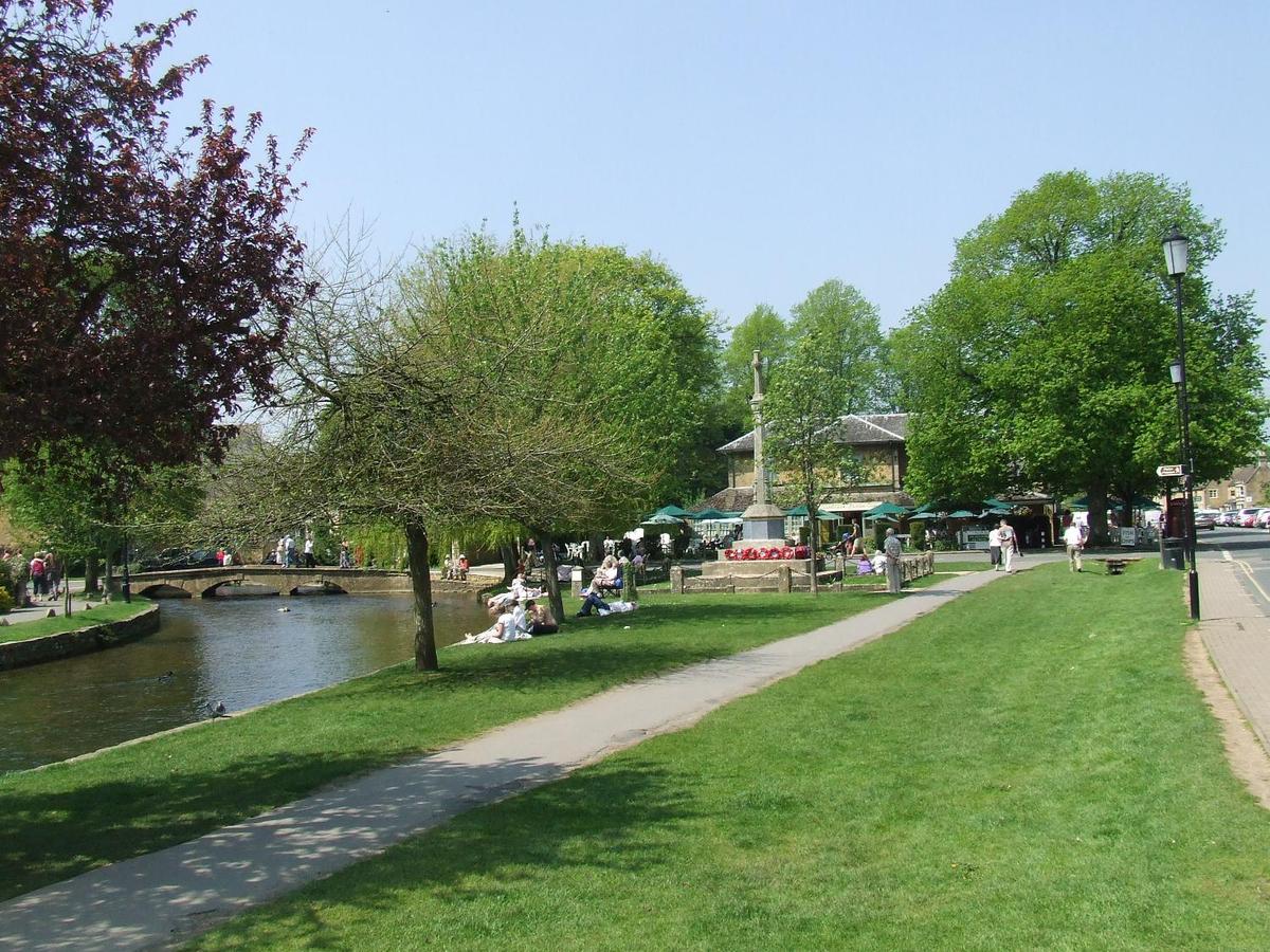 A sunny afternoon in Bournton-on-the-Water, Cotswolds district, England.