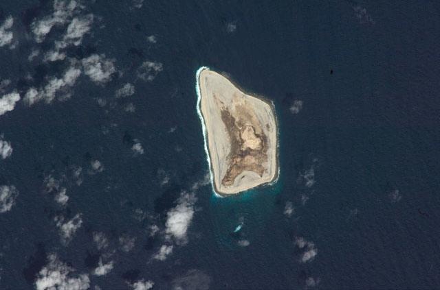 Jarvis Island is an uninhabited 4.5 sq km (1.75 sq mi) coral island located in the South Pacific Ocean. Unlike most coral atolls, the central lagoon on Jarvis is wholly dry; its deep guano deposits were mined for about 20 years during the 19th century. Image courtesy of NASA.