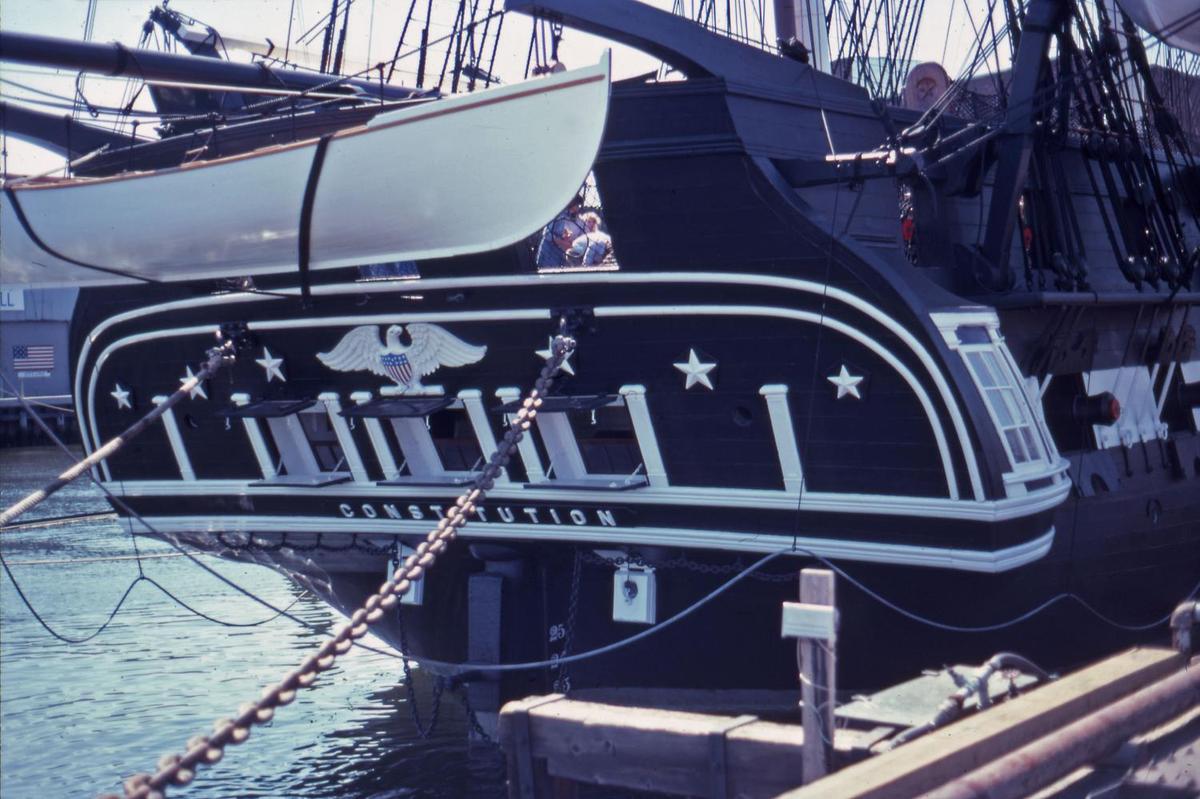The stern of the frigate USS Constitution docked at Pier 1 of the Charleston Navy Yard (Boston).