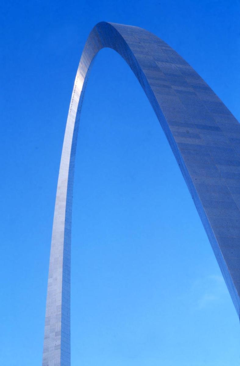 The Gateway Arch in St. Louis, Missouri, the iconic symbol of the city. The monument honors the westward expansion of the United States, much of which began in this city. Built between 1963 and 1965 (but not opened to the public until 1967), the stainless steel-sheathed structure is hollow to accomodate a unique tram system that takes visitors to an observation deck at the top. Both the height and width of the arch are 192 m (630 ft). The structure is the tallest monument in the United States and the tallest stainless steel monument in the world.