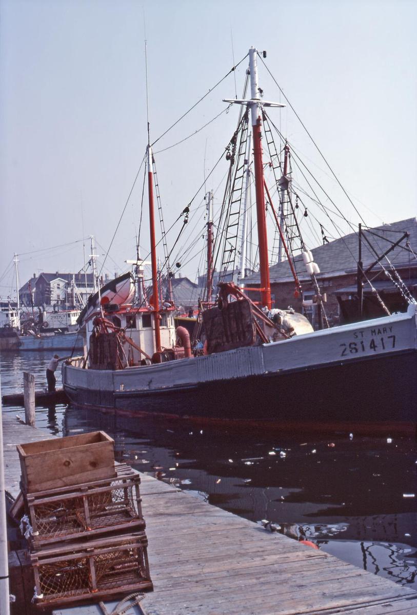 A typical lobster boat docked along Cape Cod in Massachusetts.