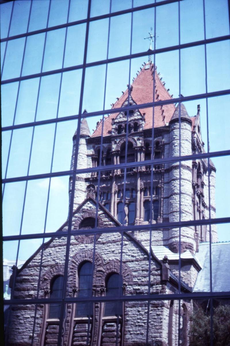 Trinity Church on Copley Square in Boston, Massachusetts lies literally within the shadow of the John Hancock Tower (New England's tallest). The church's reflection within the office building's windows creates an interesting juxtaposition of architectural styles.