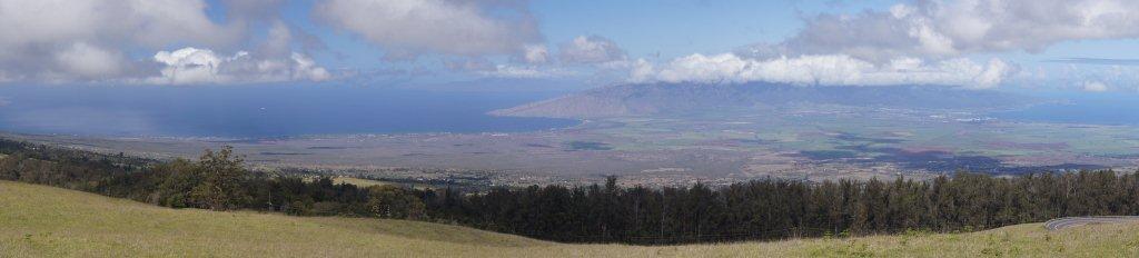 A view from the road to Haleakala on Maui shows the lush valley that lies between Kahului Bay on the right and Maalaea Bay on the left.