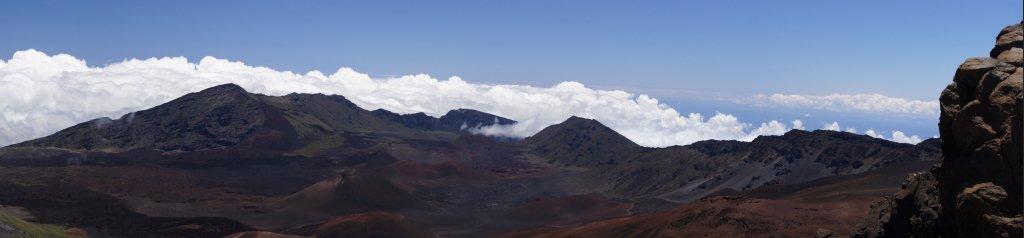 Panorama of Haleakala (House of the Sun) crater in East Maui; the volcano forms three quarters of the island of Maui. The oblong crater is roughly 11 km (7 mi) long, 3 km (2 mi) wide, and 800 m (2,600 ft) deep and lies within Haleakala National Park.