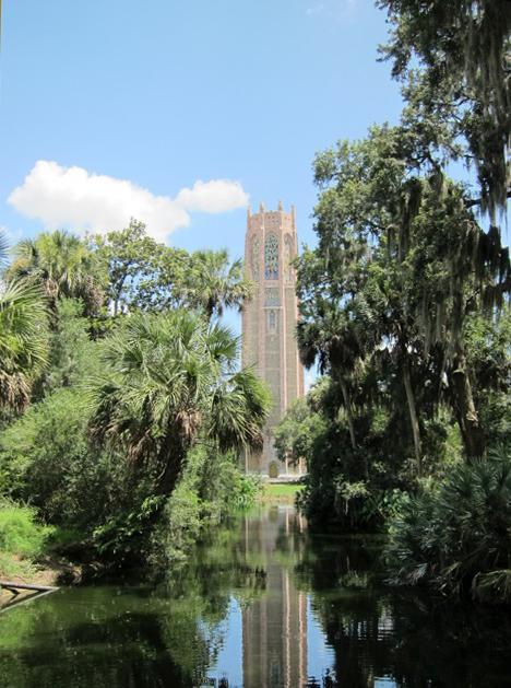 The 62.5 m (205 ft) Singing Tower - composed of marble and coquina (limestone formed of shells and coral) - is the focal point of Bok Tower Gardens (Lake Wales, Florida). Dedicated by President Calvin Coolidge in 1929, the tower is listed as a National Historic Landmark. Carillon music is played daily.