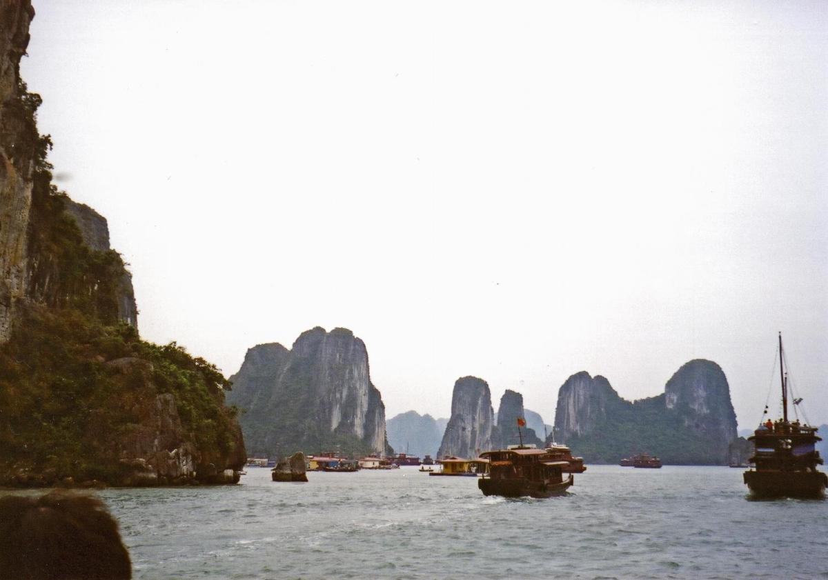 A few of the many limestone monolithic islands in Halong Bay.