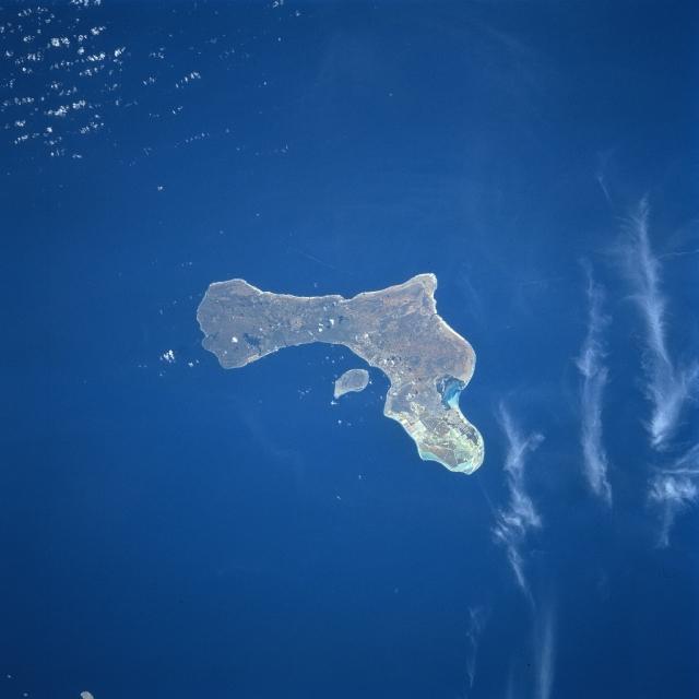 The coral-fringed island of Bonaire is located some 80 km (50 mi) north of Venezuela; its landscape is semi-desert. Tourism is one of the most important industries of the island. Diving and snorkeling are two of the most popular recreational sport activities. Image courtesy of NASA.