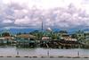 Another view of the water village of Kampong Ayer; the Sultan Omar Ali Saifuddin Mosque looms in the background.