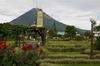 Volcano Arenal, seen here from the town of La Fortuna, remains active. Lava flows continue on the opposite side of the great cone (away from this view).