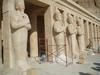 Statues of Hatshepsut as the god Osiris before the Mortuary Temple of Hatshepsut at Deir al-Bahri.