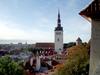 Rooftop view of the lower town of Tallinn as seen from the upper town. The prominent church is that of Saint Nicholas, originally built in the 13th century. Partially destroyed by Soviet bombing during World War II, the church was restored and is today used as an art museum and concert hall.