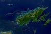 This satellite image shows Fiji's second-largest island, Vanua Levu, and the Cakaulevu Reef that shelters the island's northern shore. Also called the Great Sea Reef, Cakaulevu shines turquoise through clear, shallow waters. It is the third longest continuous barrier reef in the world, behind the Great Barrier Reef in Australia and the Mesoamerica Reef off Central America. When combined with the nearby Pascoe Reef, Cakaulevu Reef is about 200 km (120 mi) long. On its own, the Cakaulevu Reef covers 202,700 sq km (77,200 sq mi).
The first systematic survey of the reef (in 2004) revealed a diverse marine population, including unique mangrove ecosystems and endemic fish. Twelve threatened species live within the reef: 10 fish species, the green turtle, and the spinner dolphin. All of this marine life has traditionally supported the native population, and currently some 70,000 people depend on the reef. After seeing fish populations decline in recent decades, local leaders created a series of marine protected areas in 2005 where fishing is prohibited. Where the ban has been enforced, fish populations have rebounded and spilled over into areas where fishing is permitted. Photo courtesy of NASA.