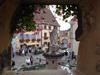 A statue of Saint-Leo IX stands in the main square of Eguisheim before the church of Saint Peter and Saint Paul. Saint-Leo IX was born in Eguisheim and became Pope in 1049.