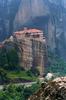 Rousanou Monastery in the Meteora region was one of 20 monasteries built on natural sandstone pillars in the 14th century by monks taking refuge from the advancing Turks. The only ingress was by ladder or rope and net.