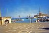 Mandraki Harbor at Rhodes, the site of a third century B.C. statue to the Greek sun god, Helios. Standing some 30 m (100 ft) high, it became known as the Colossus of Rhodes, and was considered one of the Seven Wonders of the Ancient World.