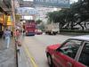 A street scene on Nathan Road in downtown Kowloon in Hong Kong. Double-decker buses are popular.