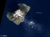 The mild eruptions of Italy&apos;s Stromboli volcano are so frequent and numerous that an entire style of volcanism - strombolian - is named after the volcano. Characteristics of strombolian eruptions are nearly continous lava fountaining and emissions of gas, ash, and volcanic bombs. The sight of lava spraying into the night sky has led folks to nickname Stromboli the &quot;Lighthouse of the Mediterranean.&quot; This natural-color satellite image shows the island of Stromboli, the volcano&apos;s cloud-covered summit (about 924 m; 3,030 ft above sea level), and a thin volcanic plume on 13 January 2011. The current eruption has continued uninterrupted since 1932. Image courtesy of NASA.
