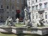 La Fontana del Moro (The Fountain of the Moor) at the south end of the Plaza Navona in Rome shows a Moor wrestling with a dolphin surrounded by four tritons. The fountain and tritons were executed by Giacomo della Porta in 1575.  The statue of the Moor by Gian Lorenzo Bernini was added in 1653.  The originals of the figures were moved to the Villa Borghese in 1871.