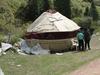 A typical Kyrgyz yurt, a portable, bent-wood framed shelter covered by layers of fabric, typically felt.  