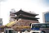Namdaemun (Sungnyemun) in Seoul was the "Great Southern Gate" in the walls that once surrounded the city. This view was taken before the wooden upper portion was destroyed in a 2008 fire. The national treasure is currently being restored.