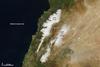 Bordering the eastern Mediterranean Sea, Lebanon might call to mind sunny beaches and historic port cities like Sidon and Tyre. However, the country is also home to towering, snowy mountains and ski resorts. In fact, the name Lebanon is derived from the Semitic word lbn, which means "white" in reference to either the snow-covered mountains or limestone cliffs. This satellite image highlights the country's two mountain ranges, Jebel Liban and Jabal ash Sharqim, covered in fresh snow. (Jebel or jabal mean "mountain" in Arabic.) Snow is not unusual in Lebanon, where ski resorts are open about three months of the year. Photo courtesy of NASA.