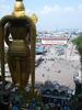 The statue of Lord Murugan, a Hindu deity, overlooks the plaza before the Batu Caves. 