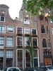 Modernized facades on older buildings in Amsterdam.