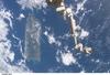 The Space Station Remote Manipulator System (SSRMS) or Canadarm2 appears against the Caribbean Sea in this view taken from the International Space Station. Puerto Rico is the large island on the left side of the frame. Click on photo to increase resolution. Image courtesy of NASA.