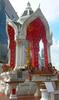 A spirit house in front of Central World Plaza, Bangkok.