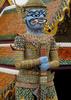 A Yaksha demon guards the Wat Phra Kaew (Temple of the Emerald Buddha) in the Grand Palace in Bangkok.
